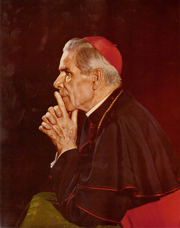 Archbishop Fulton J. Sheen praying