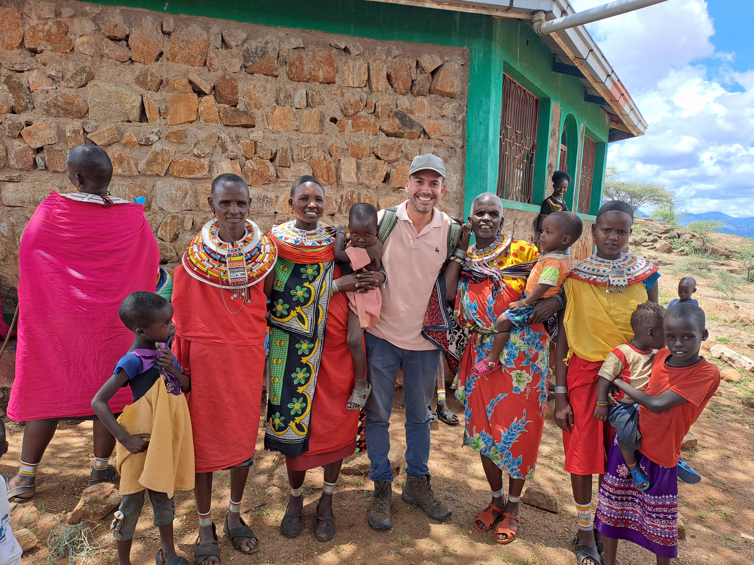 Missinary Father Jimmy Alexander Gil Ocampo, a Colombian priest with the Missionaries of Yarumal, with some of the women and children of the community he serves.