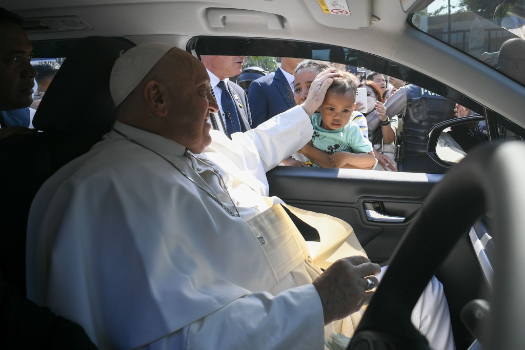 Pope Francis, as he departs an interreligious meeting in Indonesia.