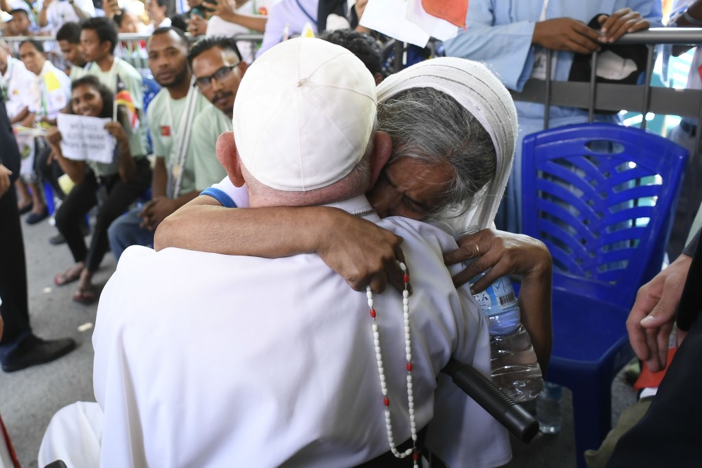 A nun embraces Pope Francis during a meeting with bishops, priests, deacons, religious, seminarians and pastoral workers at Immaculate Conception Cathedral in Dili, Timor-Leste, Sept. 10, 2024. 