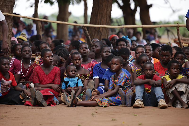 1,500 parishioners live the sacrifice of the Mass in St. Bernadette’s Parish in Chitula, Malawi. Seemingly unaffected by the heat and the tardiness, their faces radiating warmth and anticipation.