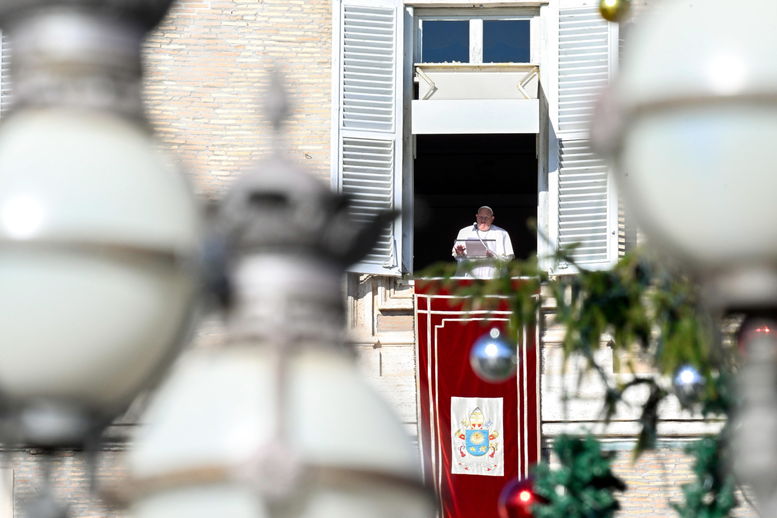 On the feast of St. Stephen, Pope Francis speaks to visitors in St. Peter's Square gathered to pray the the Angelus on Dec. 26, 2024. (CNS photo/Vatican Media)