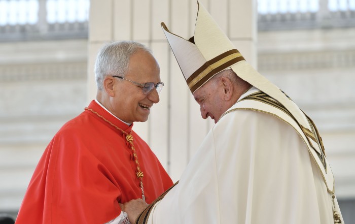 Pope Francis greets then-Cardinal Robert F. Prevost during a consistory in St. Peter's Square at the Vatican Sept. 30, 2023. U.S.-born Cardinal Prevost became the first American pope in history when he was elected at the Vatican May 8, 2025, choosing the papal name Leo XIV. He succeeded Pope Francis, who died at age 88 April 21, 2025. (CNS photo/Vatican Media)
