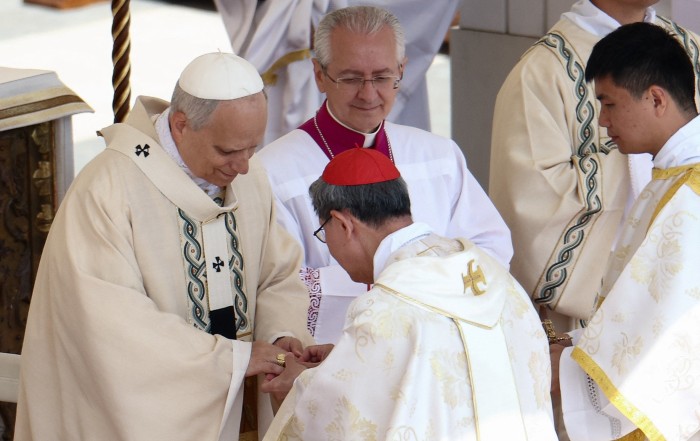 Cardinal Luis Antonio Tagle, pro-prefect of the Dicastery for Evangelization under Pope Francis, places the papal fisherman's ring on Pope Leo XIV, as the pontiff celebrates his inauguration Mass at the Vatican May 18, 2025. He is the first American pope in history. (OSV News photo/Guglielmo Mangiapane, Reuters)