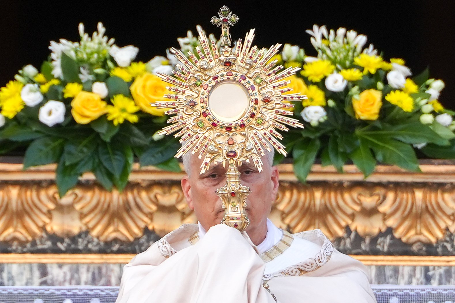 POPE LEO XIV CORPUS CHRISTI CELEBRATION 2025 Pope Leo XVI raises the monstrance during Benediction after a Corpus Christi.